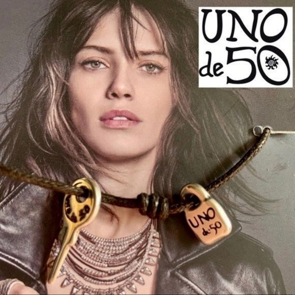 Uno de 50 Adjustable leather bracelet with lock and key. New on original card.
